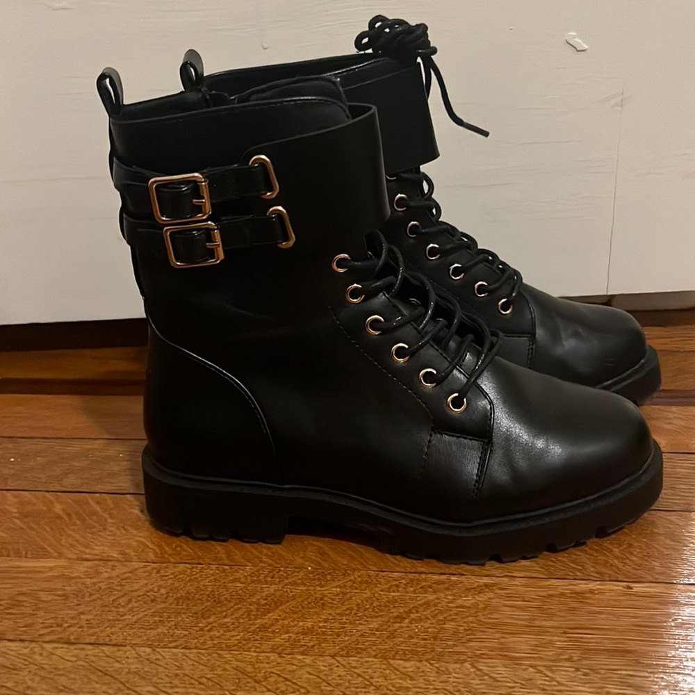 Black and gold combat boots